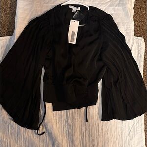 New blk Flared Sleeve Blouse. Size M.
